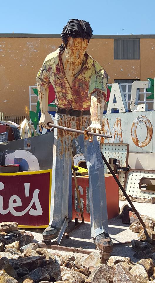 No Neon Museum photo array is complete without the 10 foot pool player that once advertised Doc and Eddy's Pool Hall.