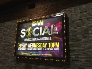 gold spike social club sign
