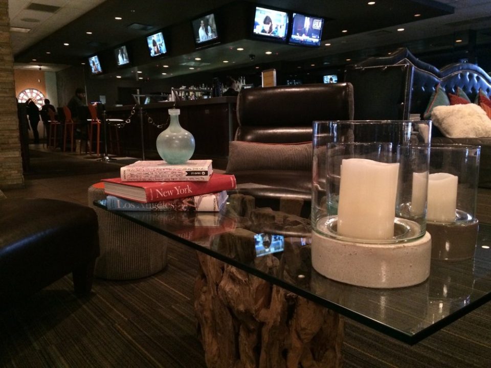 One of the conversation areas, set up by the main bar and the large bed at gold spike social club